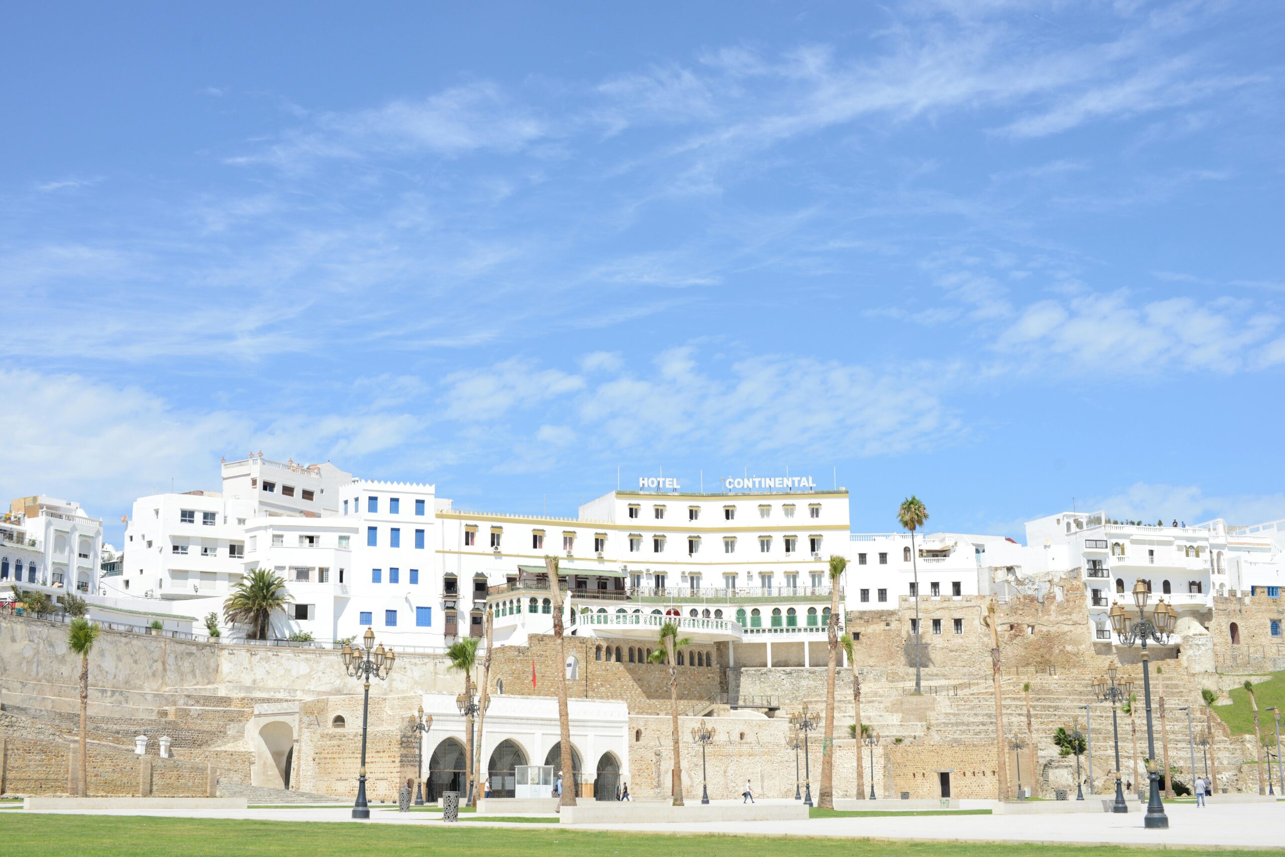 View of the historic Hotel Continental against the blue sky in Tangier, reflecting Moroccan architecture.