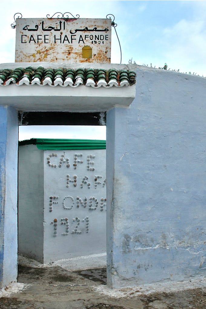 Discover the historical entrance of Café Hafa, a cultural landmark in Tangier, Morocco.